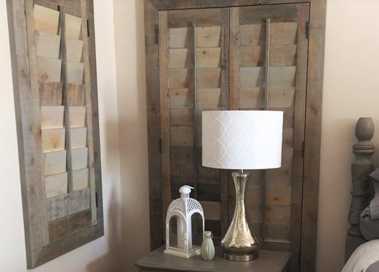 Fort Myers bedroom with recycled wood shutters.